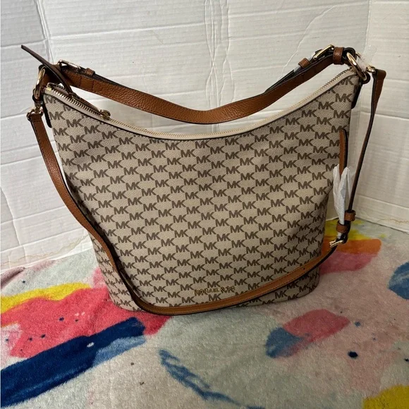 Shop Michael Kors Outlet Bags in 2026 Michael Kors Cream and Brown Shoulder Bag with Monogram Print main image 2